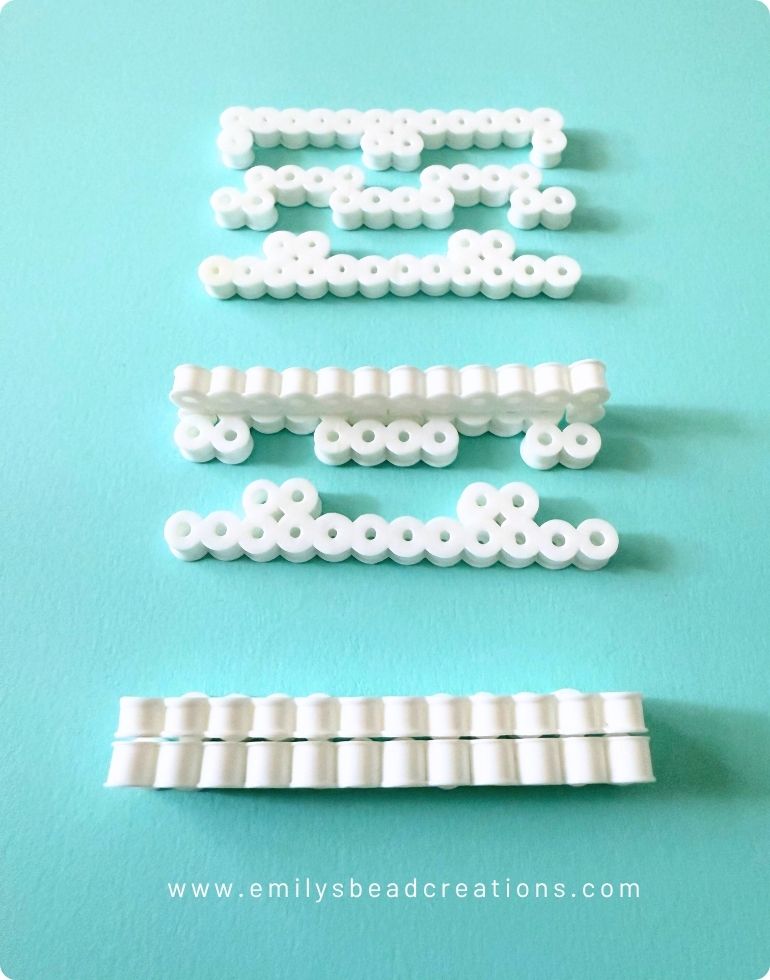 A photo of ironed perler beads. The top shows a disassembled tentacle, the middle shows one in progress, and the bottom shows the assembled tentacle.